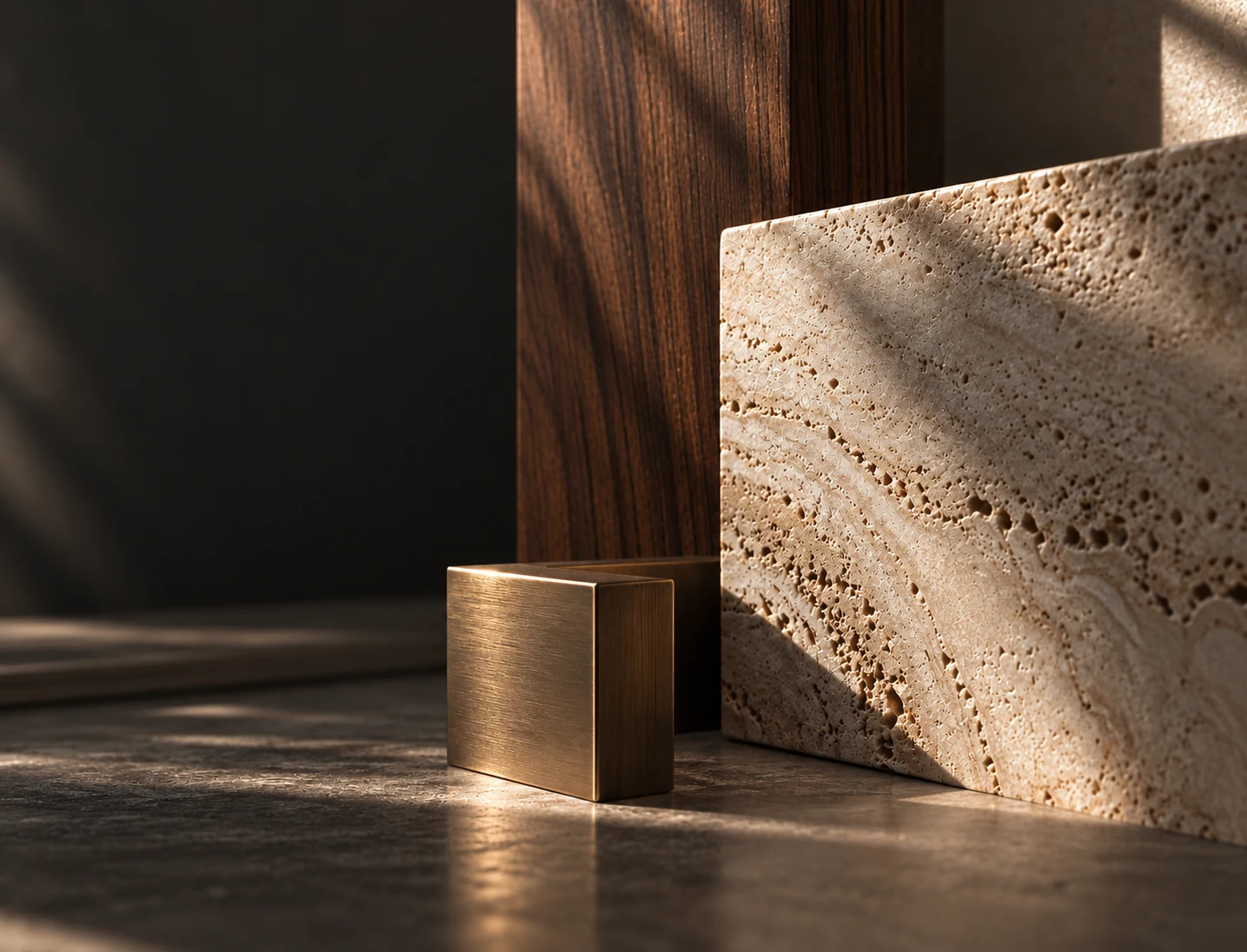 Warm travertine, walnut and brushed bronze, brought together in a tactile material palette.